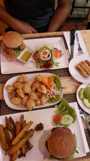 Chicken burger and black bean burger at Vegan Heaven in Chiang Mai