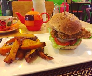 Fake chicken burger with sweet potato fries at Vegan Heaven in Chiang Mai