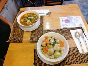 Rard-na soup (sooo interesting, try it!) and tom yum soup at Vegan Heaven in Chiang Mai