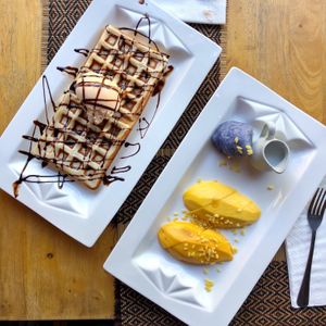 Waffle with chocolate and vanilla ice cream & mango sticky rice at Vegan Heaven in Chiang Mai