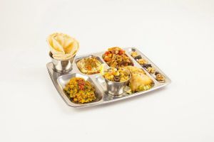 Rajasthan Thali (dal, humus, seitan and baked curry vegetables, cus cus, samosa and pita bread)  at Teteria India in Barcelona