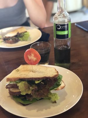 “Bite me” sandwich and a bottle of Cloro-Oxygen👌🌱 at Sayuri Healing Food in Ubud