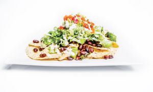 Loaded Nachos
Loaded Nachos, Chili, Guac, Salsa, Lettuce, Vegan Cheeze, Maple BBQ sauce. at Juice 2 U in Pompano Beach