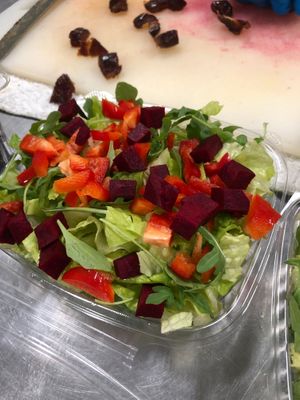 Making a fresh daily Summer Salad at Juice 2 U in Pompano Beach