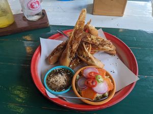 Tasty and piping hot spring rolls, tasty dipping sauce, tasty salad. at Happy Veggie in Koh Lanta