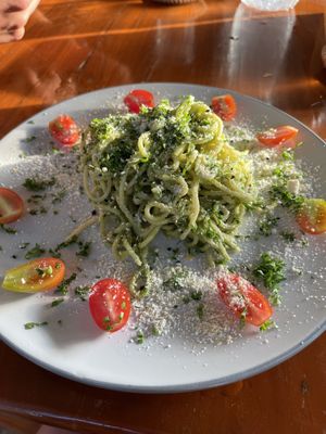 Pesto Pasta. Spaghetti with homemade pesto and tomatoes. Sprinkled with breadcrumbs    at Happy Veggie in Koh Lanta
