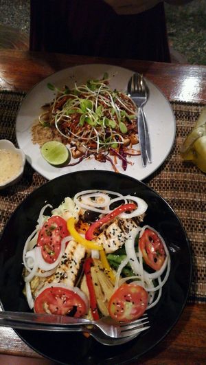 raw pad thai and a salad with tofu  at Happy Veggie in Koh Lanta