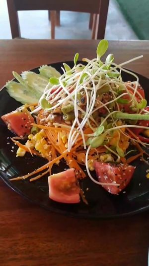Papaya corn salad. The best! Really love it!  at Happy Veggie in Koh Lanta