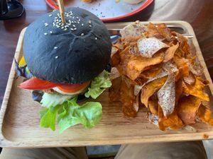 Veggie burger with sweet potato crisps  at Happy Veggie in Koh Lanta