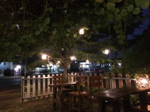 Near the front of the lovely outdoor seating area.  at Happy Veggie in Koh Lanta