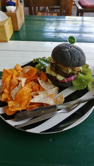 Veggie burger with crisps at Happy Veggie in Koh Lanta