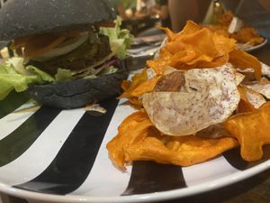 Black bean and sweet potato burger with sweet potato chips  at Happy Veggie in Koh Lanta
