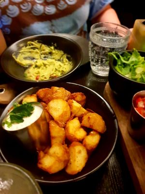 Roasted potatoes with cashew cream. at Pancho Villa in Hobart