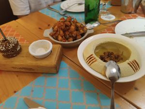 Falafel with tahina sauce, hummus and potatoes at Mish Mish in Alicante