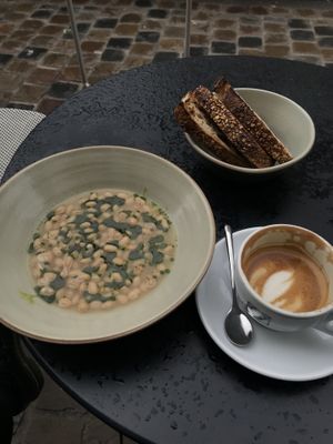 Brothy beans with sourdough bread  at Mok in Brussels