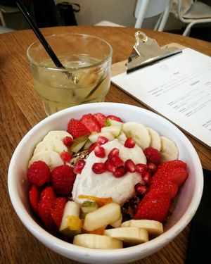 Granola bowl with soy yoghurt and kombucha tea at Mok in Brussels