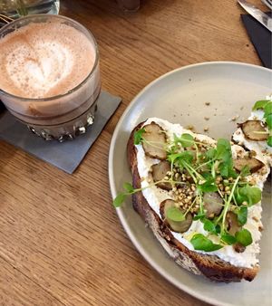 Hot chocolate and toast with almond feta. All vegan! at Mok in Brussels