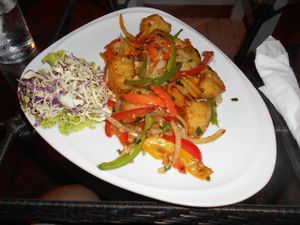 Rim Talay Restaurant  - Fried Potatoes with Vegetables, Onions and Garlic (salad on the side) 179b  Impressed by the great taste! at Rim Talay in Pattaya