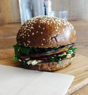 Our most popular burger, meet The Funguy! A portobello shroom seasoned with fresh rosemary, then packed with in house sauces and salad to create a succulent guilt free treat! at Herbivore Eatery in South Yarra