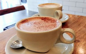Red velvet almond latte and soy flat white at Herbivore Eatery in South Yarra