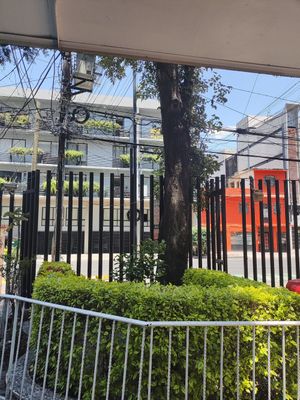 El local está justo enfrente de estos edificios (frente a Av Coyoacán 1424) at Veganisimo Loncheria in Mexico City