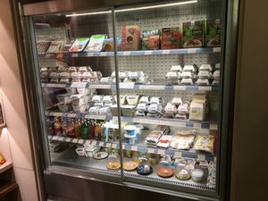 Display case with the cheeses! at Jay & Joy in Paris