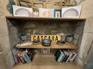 Bookshelf and art for sale  at Cascara in Bath