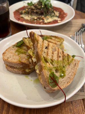 Chickpea toastie in the foreground, beetroot pancake in the background. at Cascara in Bath