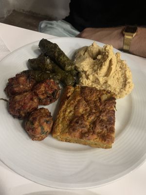 Hummus + zucchini cake + falafel + wine leaves stuffed at Vegan Istanbul in Istanbul