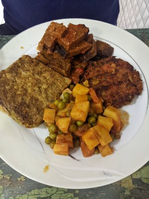 seitan, zucchini fritter and two other things at Vegan Istanbul in Istanbul