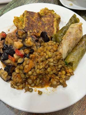 Eggplant with potatoes, lentils, zucchini loaf, stuffed cabbage (4 option meal) at Vegan Istanbul in Istanbul