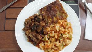 Zucchini pie, tomato pasta and eggplant with texturized soja at Vegan Istanbul in Istanbul