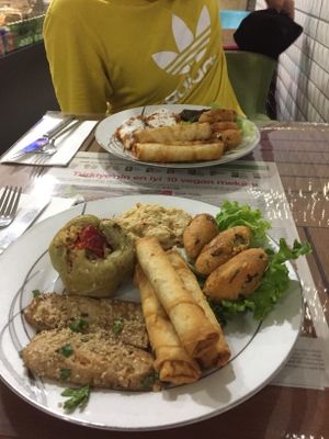 Mercimek (top right), Hommus (top middle), stuffed capsicum/Pepper/dolma (top left), good tofu (bottom left) and amazing cigarette börek (filled with vegan feta cheese! Sooo good!  at Vegan Istanbul in Istanbul