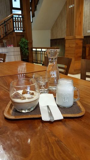 Coffee plus milk (which I think soy/oat milk). I think it's good at LN Fortunate Coffee in Palembang