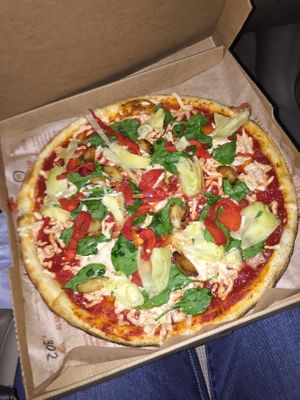 Regular crust, red sauce, vegan cheese, artichokes, roasted garlic, spinach, & roasted red peppers at Blaze Pizza in Webster