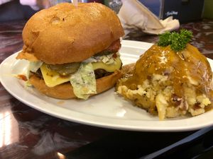 BBQ Burger with a side of mashed potatoes and gravy at Sanctuary Vegan Cafe in Knoxville
