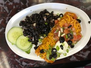 Enchilada burrito non-vegan hubby approved!!!!  at Sanctuary Vegan Cafe in Knoxville