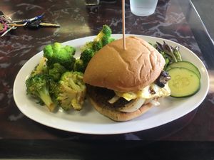 Mushroom onion burger with sautéed veggies  at Sanctuary Vegan Cafe in Knoxville
