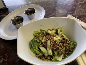 Side salad with apple cider vinegar + oil at Sanctuary Vegan Cafe in Knoxville