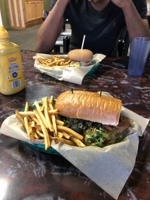 Fried chykyn seitan sandwich and fries! at Sanctuary Vegan Cafe in Knoxville