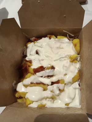 Garlic cheese chips with bacon (large) at Stoned Pizza in Dublin