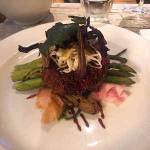 Homemade bietenburger met zoetzure kool en groene asperges en roseval at Loods Lunge Restaurant in West-terschelling
