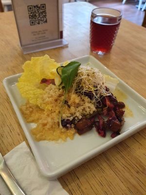 - Purple cabbage salad, green leaves mix, pine nuts and green beans sautéed in leek, orange and ginger vinaigrette, quinoa and courgette carpaccio at Mantra Gastronomia e Arte in Porto Alegre