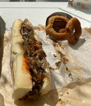 Philly Cheesesteak and Onion Rings  at HipCityVeg - Broad St in Philadelphia