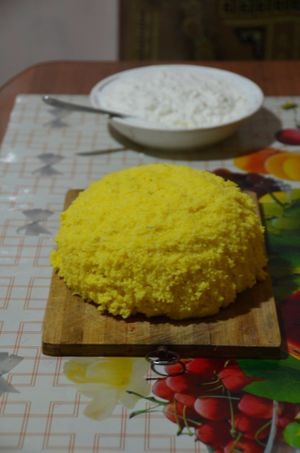 Mamaliga, traditional Moldovan food. at CostelHostel in Rosu