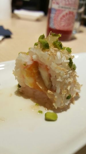 sweet inside out dessert with pistachio, coconut, banana at MakiMaki Sushi Green in Cologne