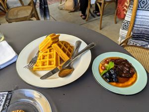 Sweet potato waffles with golden milk chutney. at Pharm Table in San Antonio