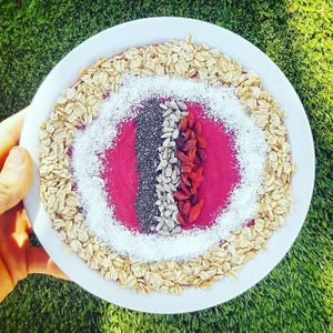 This is by far my favourite smoothie bowl. It's a smoothie of mango, carrot, beetroot, coconut milk and banana with superfoods on top. We craft it for you on order! at Namaste Lifestyle Cafe in Western Cape