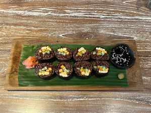 Nori Maki - red rice, marinated tempeh/tofu, carrot, cucumber, rolled in seaweed. Served with wasabi, pickled ginger and soy sauce. at Bodhi Leaf Eatery in Denpasar
