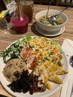 Macrobiotic plate, kimlo soup (half gone), dragonfruit smoothie, hot lemon ginger tea at Bodhi Leaf Eatery in Denpasar